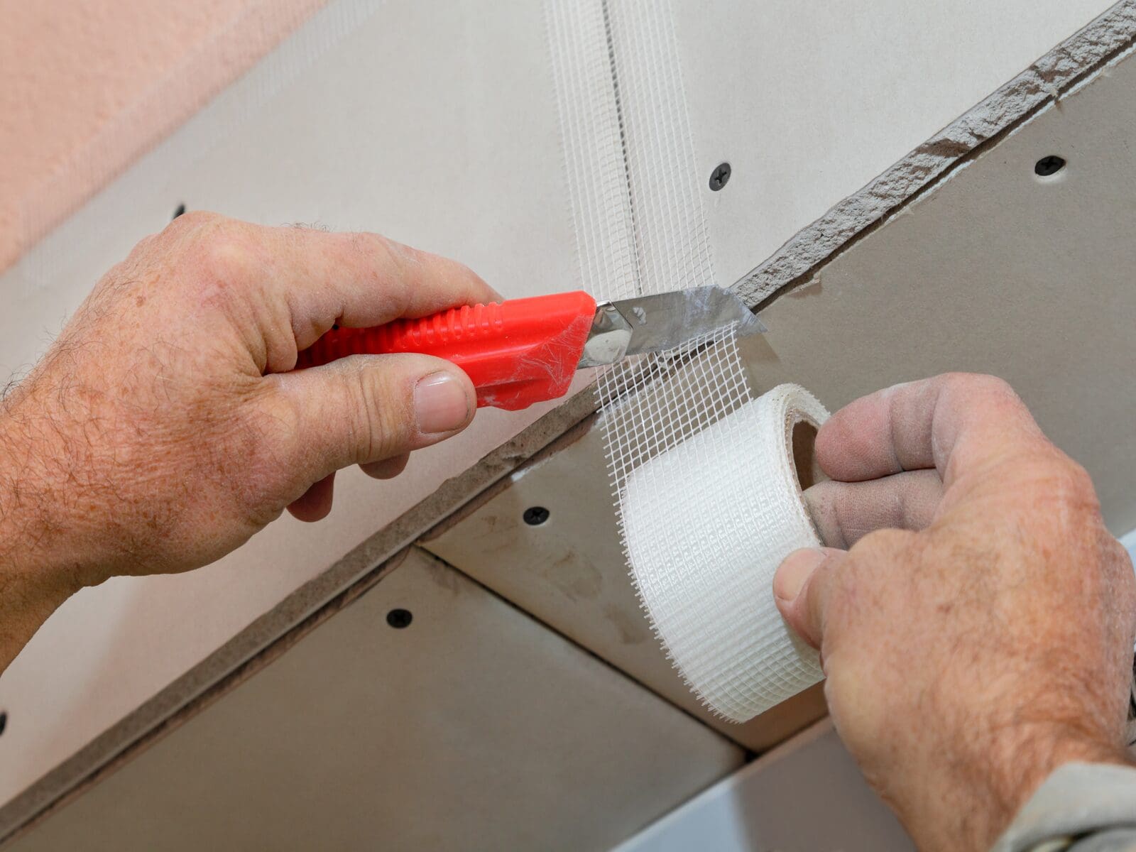 Dry Lining Finishing Applying Tape