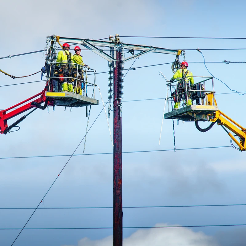 Workers Undertaking Electrical Work At Height